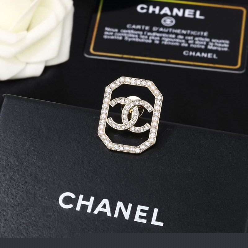 Ch*el brooches